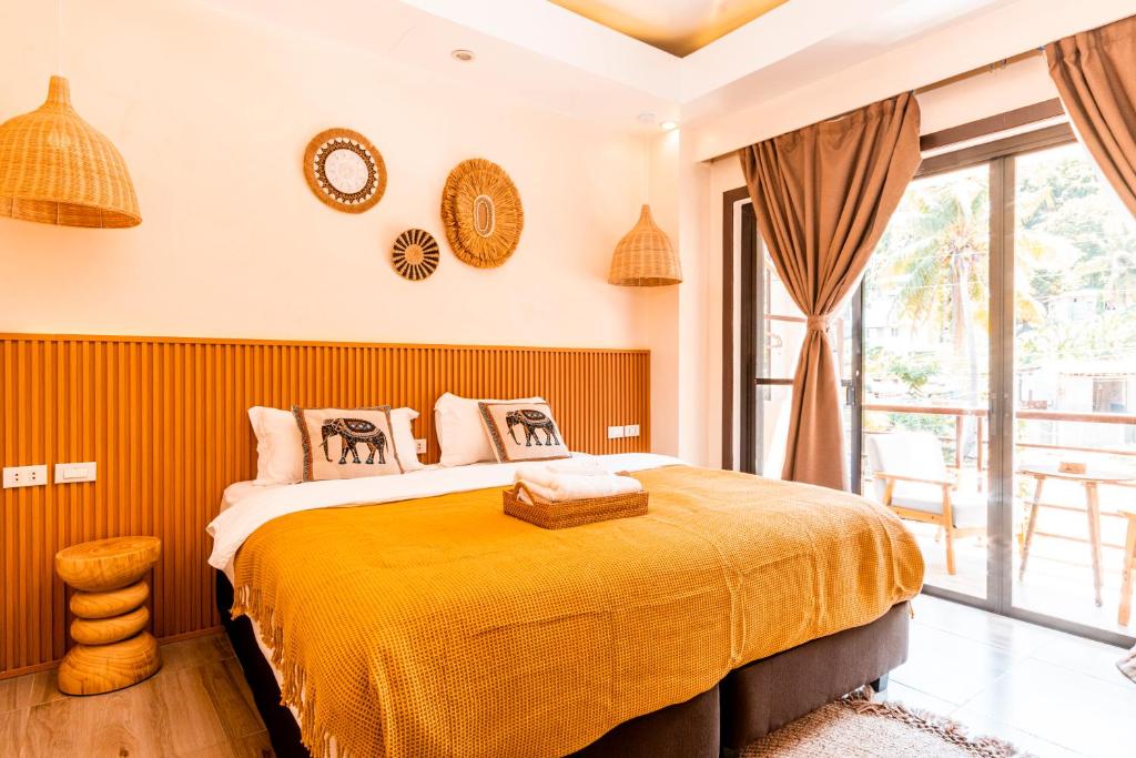 Postel nebo postele na pokoji v ubytování Molly Resorts