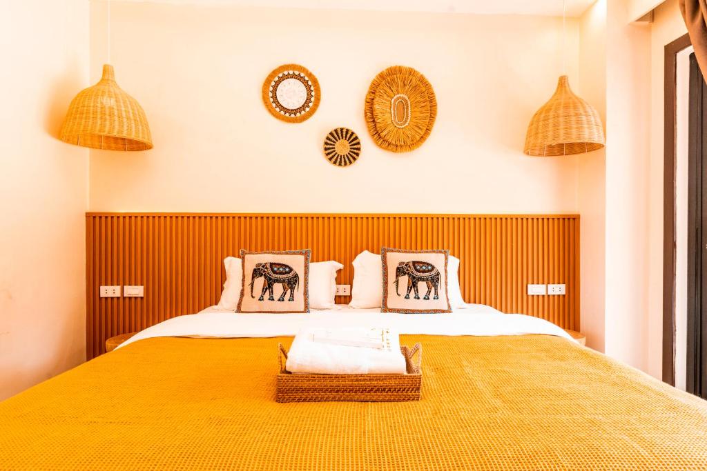 Postel nebo postele na pokoji v ubytování Molly Resorts