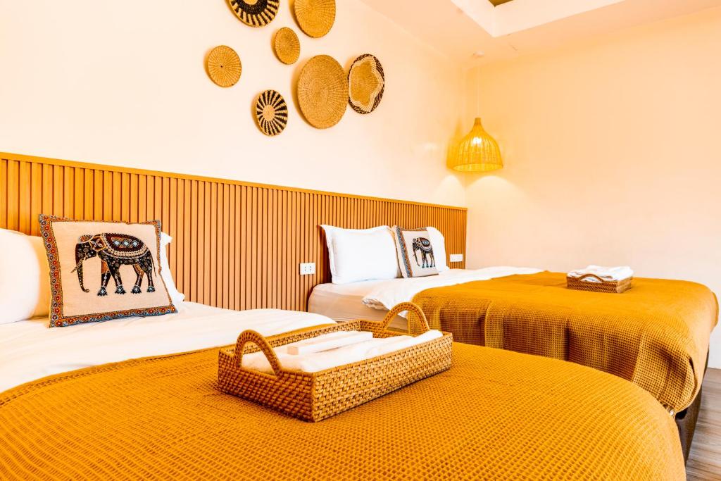 Postel nebo postele na pokoji v ubytování Molly Resorts