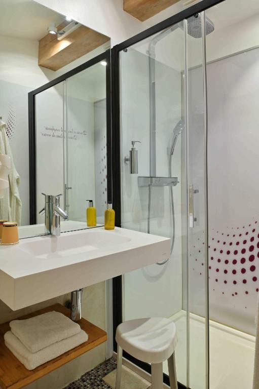 Koupelna v ubytování Hôtel Domaine A Flatta