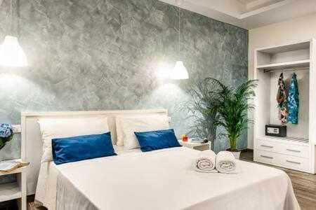 Postel nebo postele na pokoji v ubytování Dimoria Family Apartment