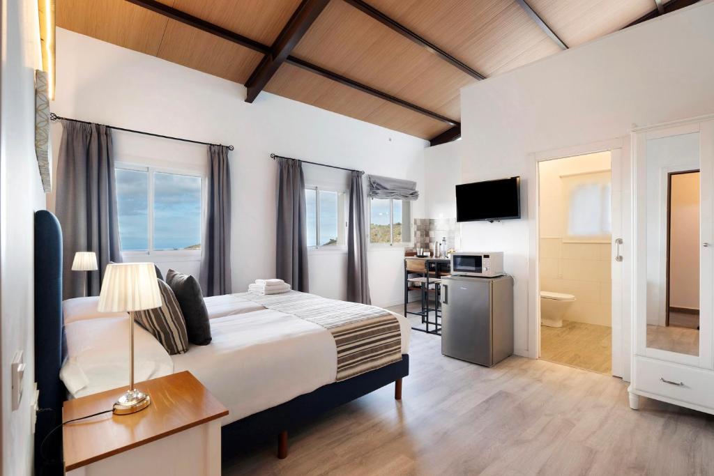 Giường trong phòng chung tại Casa Lomo el Aire By Paramount Holidays