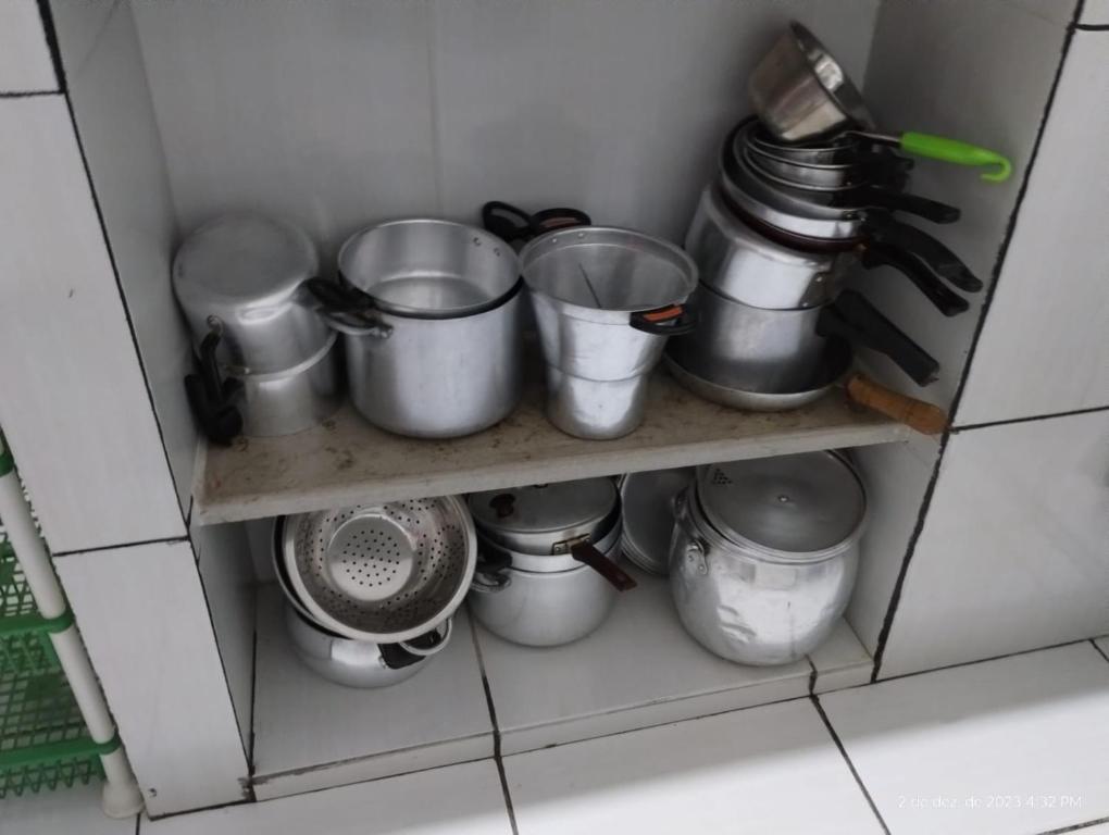 Kuchyň nebo kuchyňský kout v ubytování Aconchego do bens