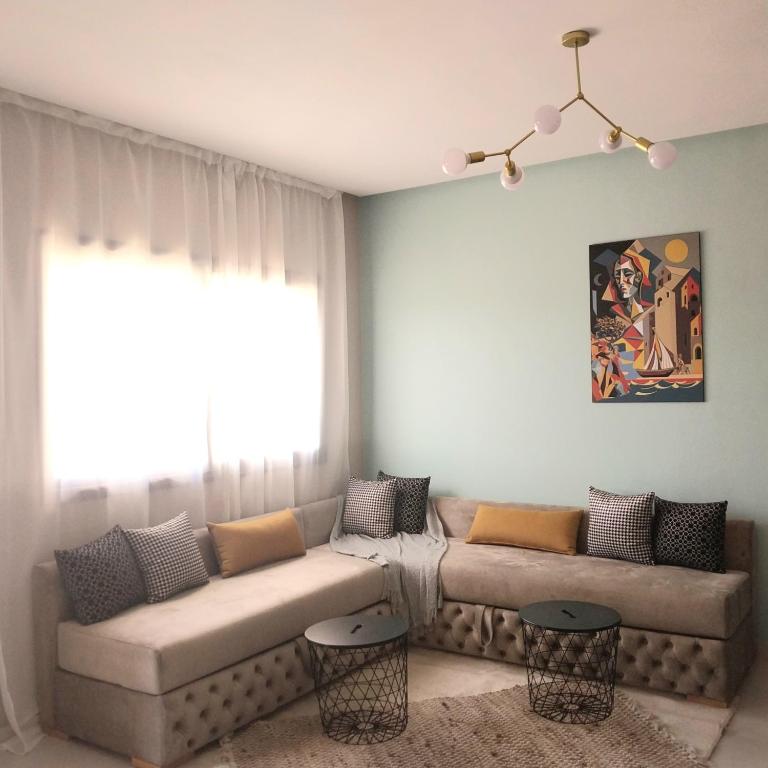 Posezení v ubytování top apartment Airport Mohamed 5