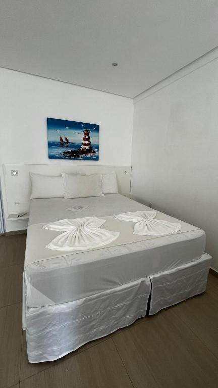 Cama ou camas em um quarto em Pousada Pedras do Mariscal