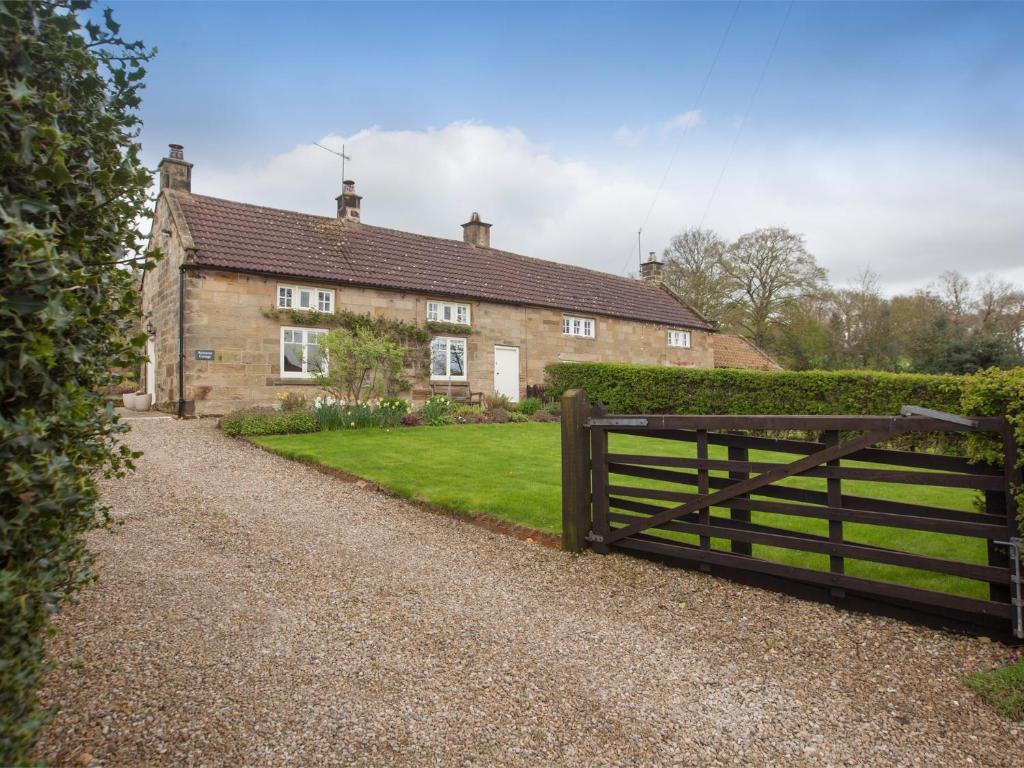 a house with a gate in front of it at 2 Bed in Osmotherley G0172 in Osmotherley