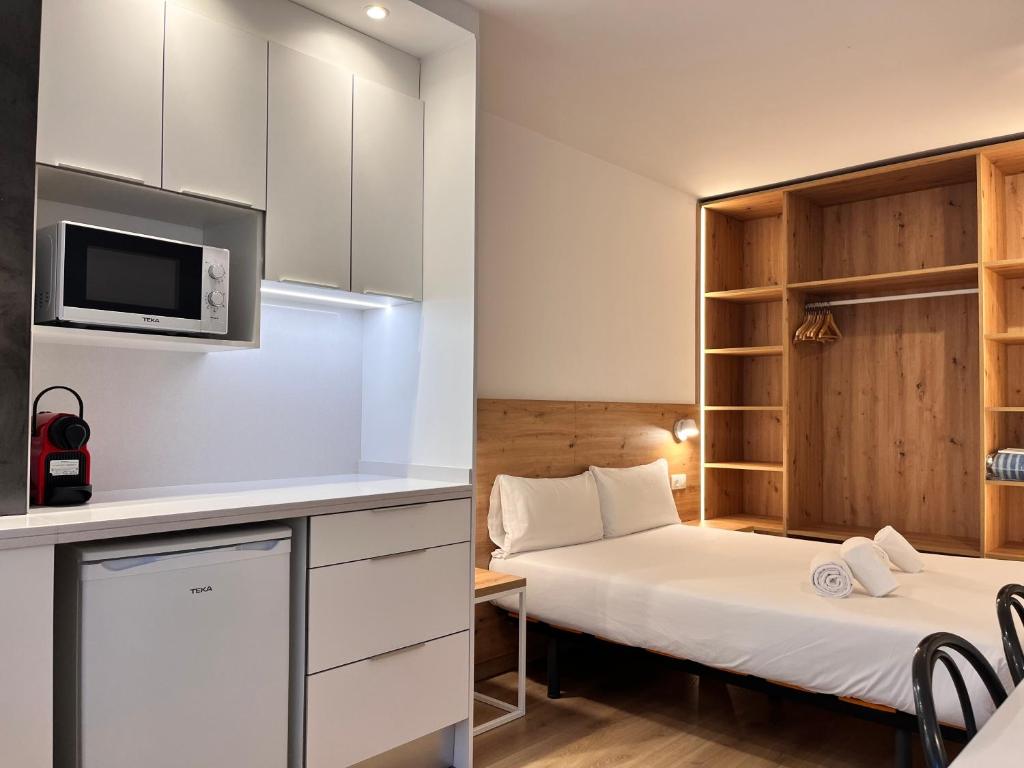 Postel nebo postele na pokoji v ubytování Outdoor Apartaments - Spot