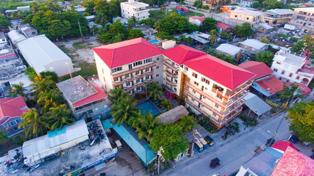 an overhead view of a building with a red roof at Tropical Palace Hotel in San Pedro