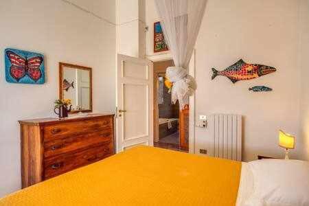 Posteľ alebo postele v izbe v ubytovaní GOCCE VILLAS - Sunshine Villa