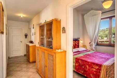 Posteľ alebo postele v izbe v ubytovaní GOCCE VILLAS - Sunshine Villa