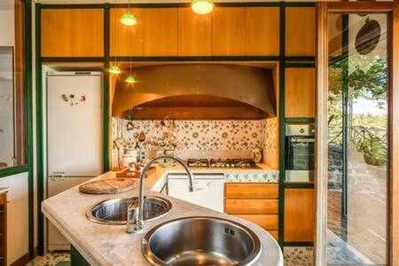 Kuchyňa alebo kuchynka v ubytovaní GOCCE VILLAS - Sunshine Villa