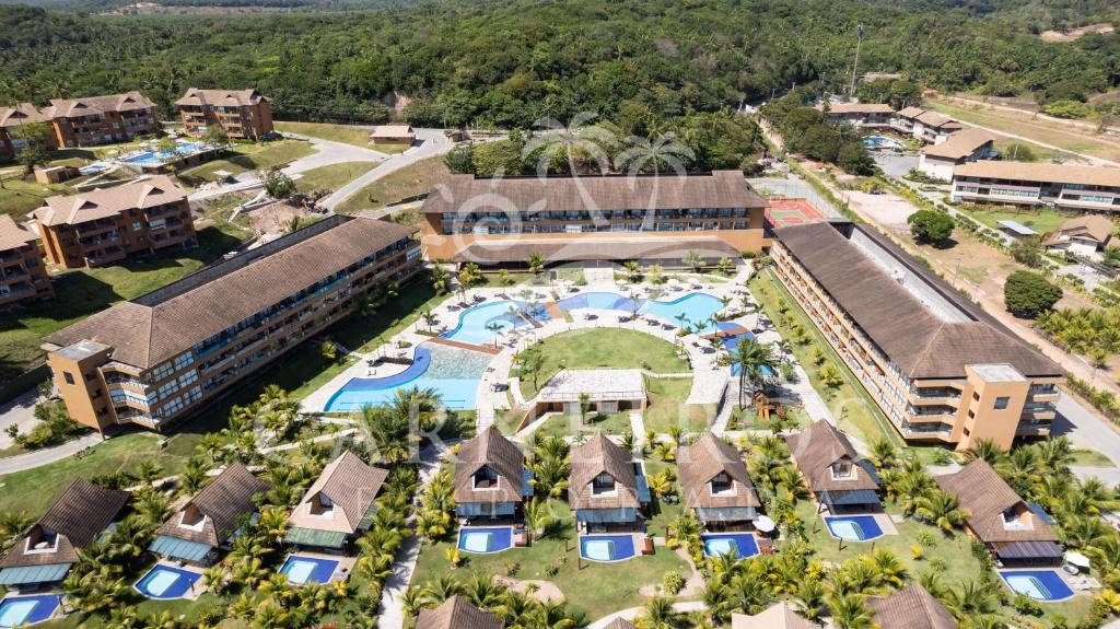 an aerial view of a resort with a pool at Eco Resort - Praia dos Carneiros - Ao lado da Igrejinha in Praia dos Carneiros