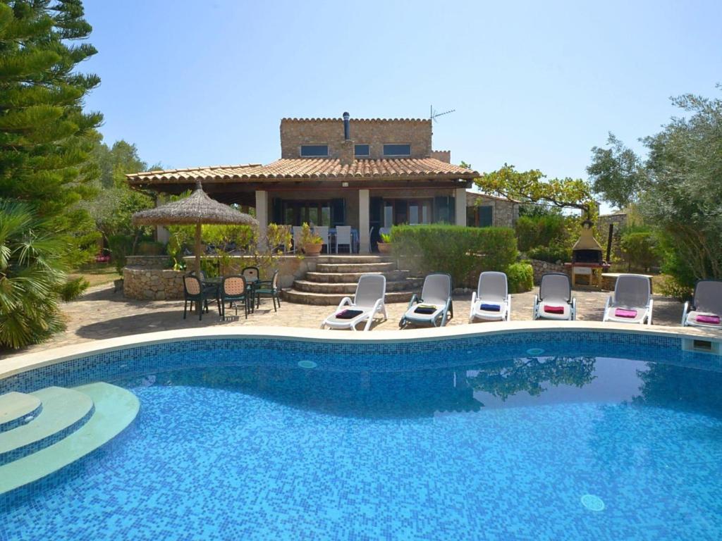 The swimming pool at or close to Holiday Home Roura by Interhome