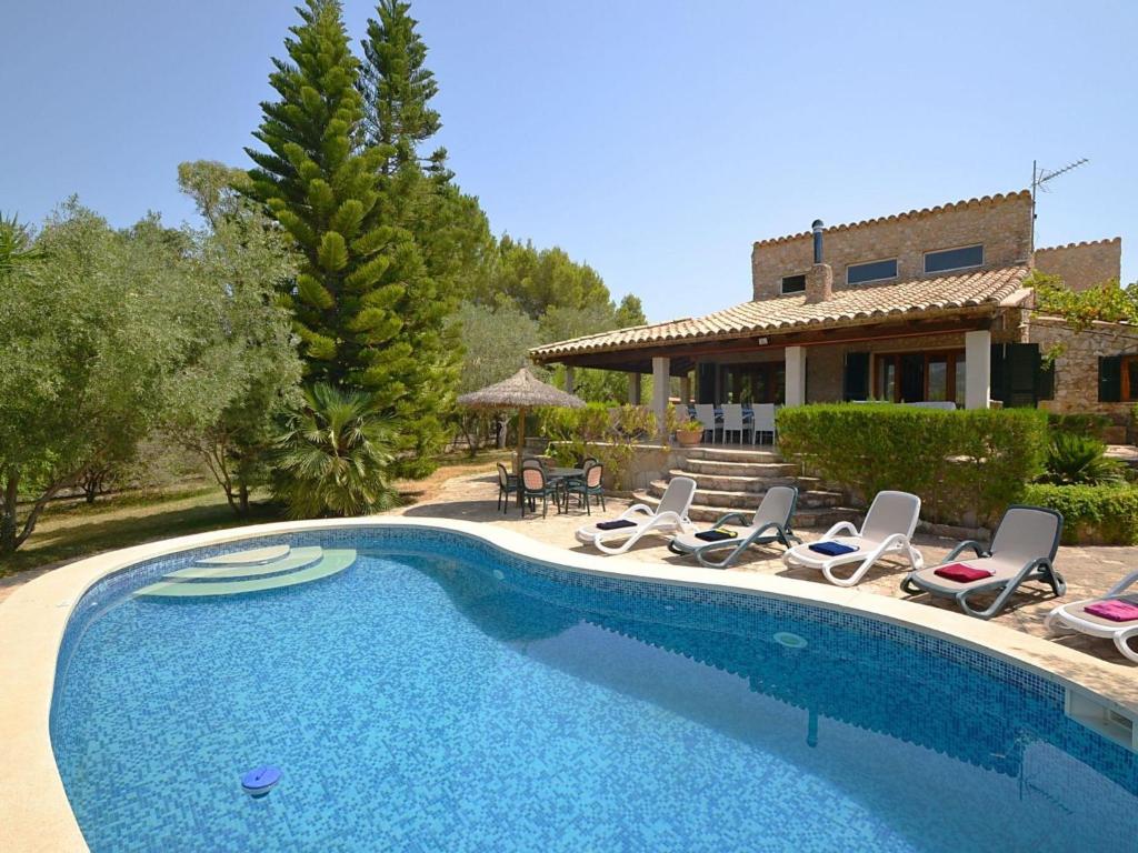 The swimming pool at or close to Holiday Home Roura by Interhome