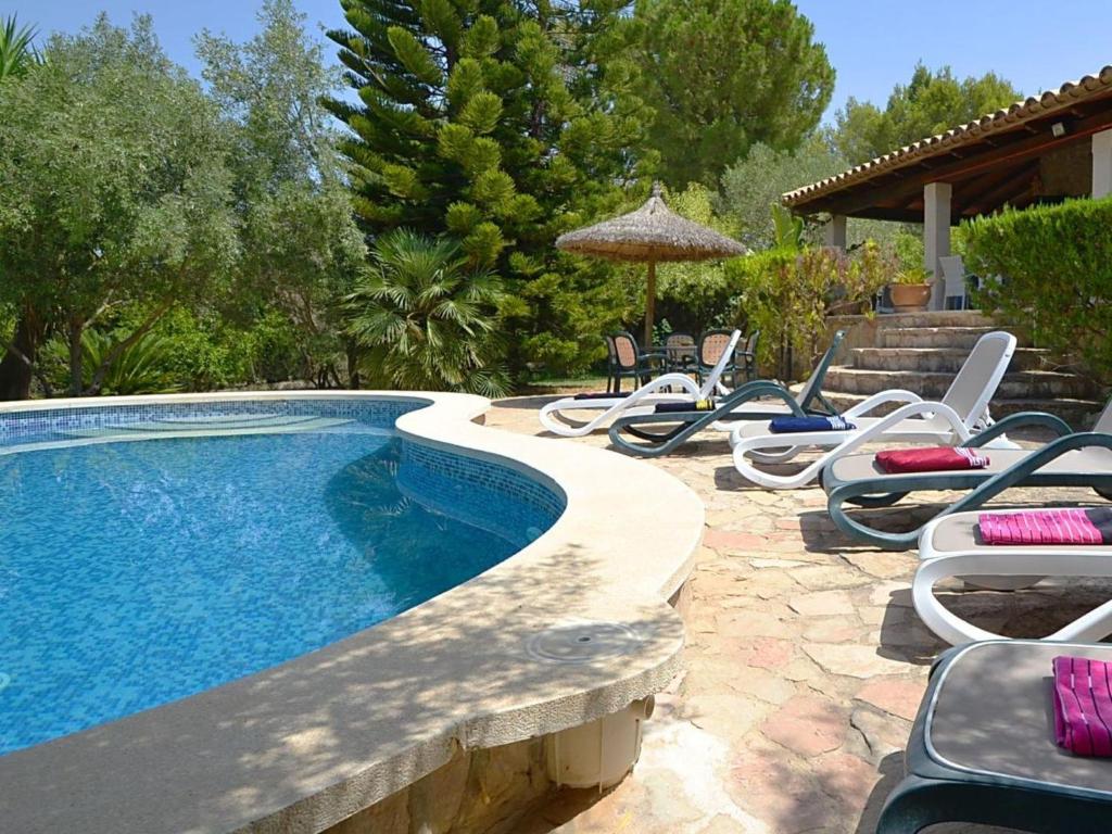 The swimming pool at or close to Holiday Home Roura by Interhome