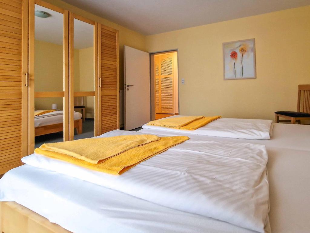 Postel nebo postele na pokoji v ubytování Störtebeker Residenz