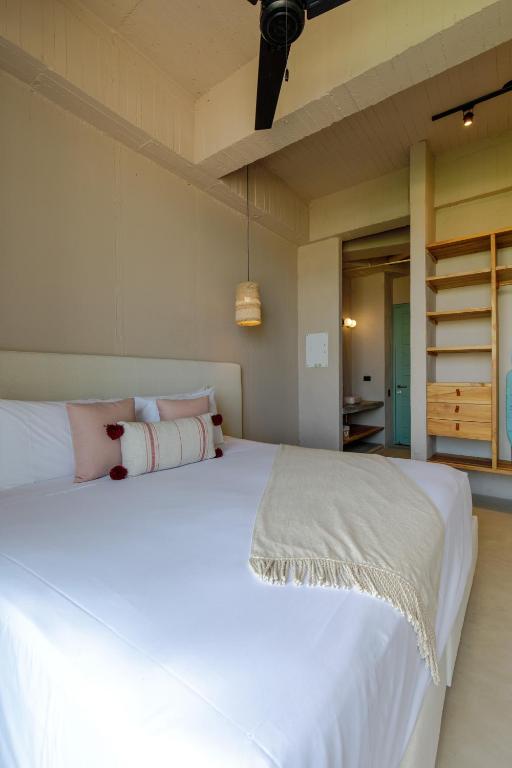 Uma cama ou camas num quarto em Bondo Estudio