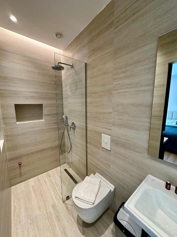 Koupelna v ubytování Venis Hotel