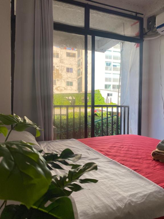 Postel nebo postele na pokoji v ubytování Posada Casamar2 alojamiento en San Andrés islas