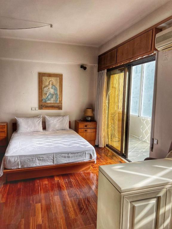Łóżko lub łóżka w pokoju w obiekcie Home House Rethymno