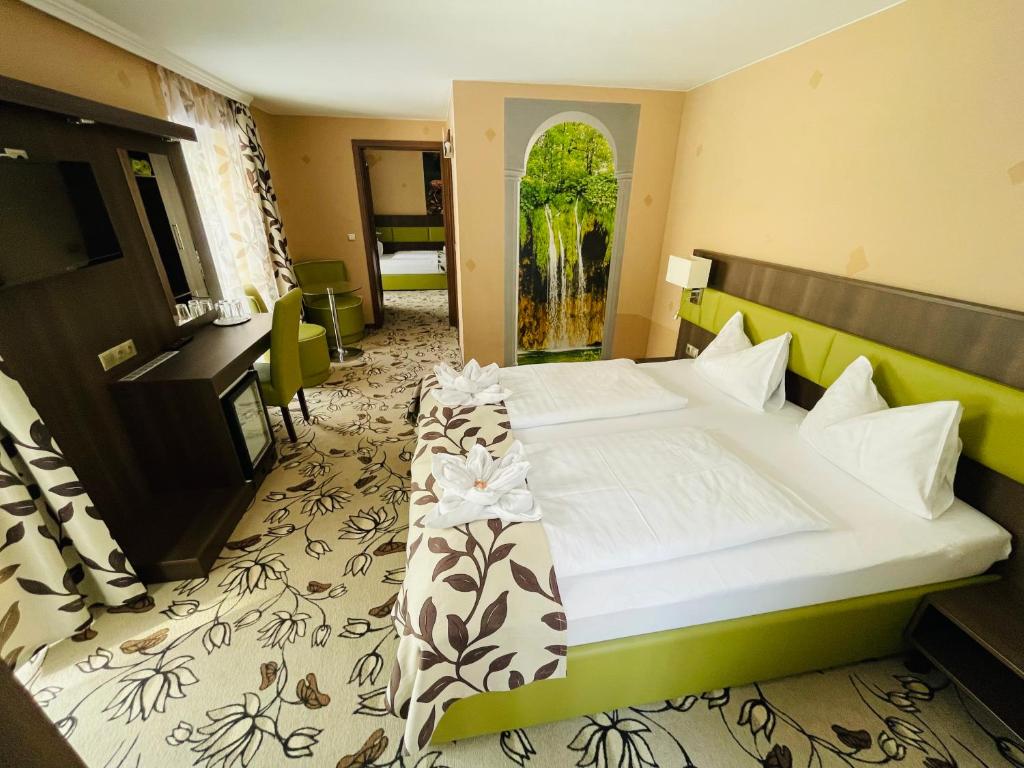 Postel nebo postele na pokoji v ubytování Hotel Pruggererhof
