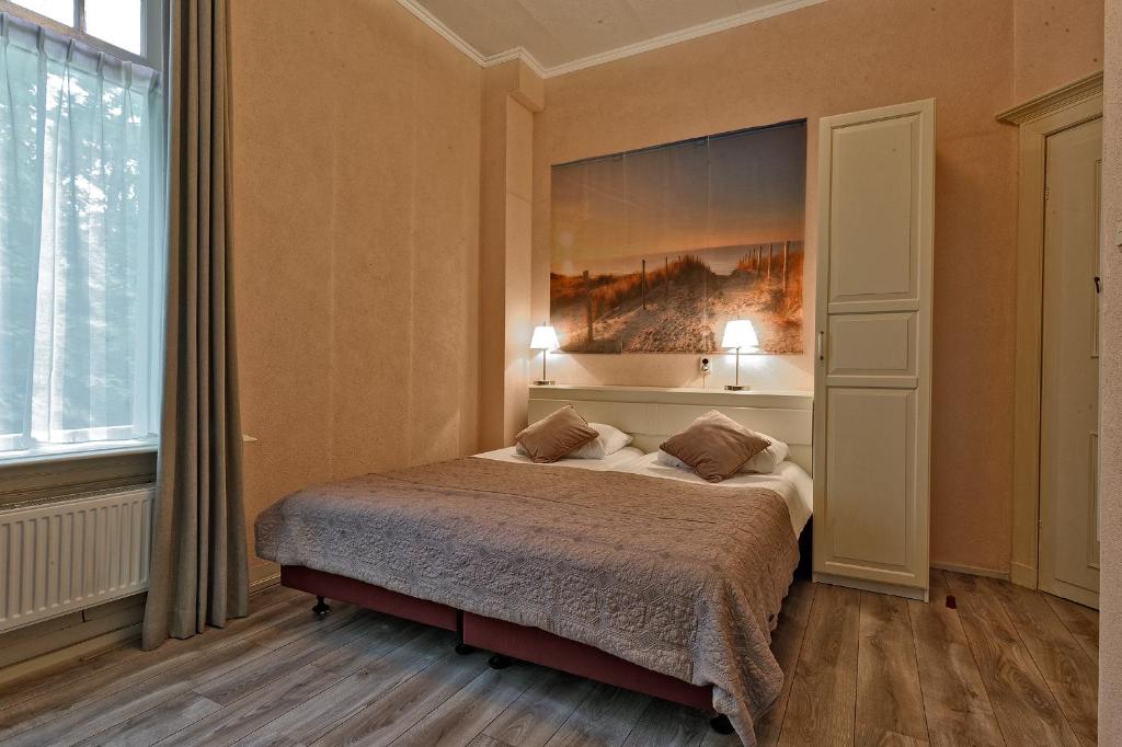 Postel nebo postele na pokoji v ubytování Mare Sanat
