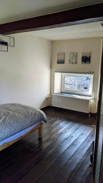Postel nebo postele na pokoji v ubytování L'ARONDE