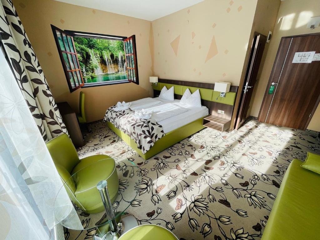 Postel nebo postele na pokoji v ubytování Hotel Pruggererhof