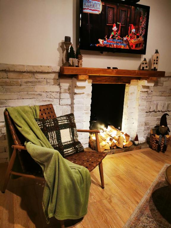 Televiisor ja/või meelelahutuskeskus majutusasutuses Guest House Relić
