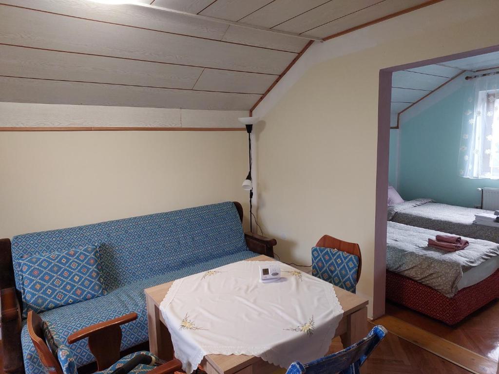 Postel nebo postele na pokoji v ubytování Аpartman ELENA