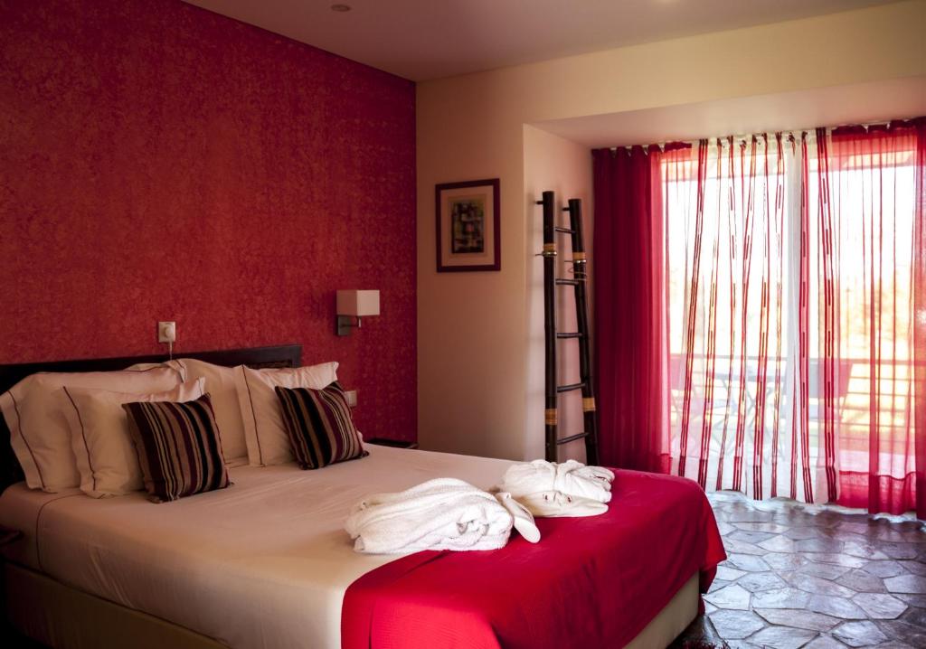 Postel nebo postele na pokoji v ubytování Monte Xisto Country Charm Hotel