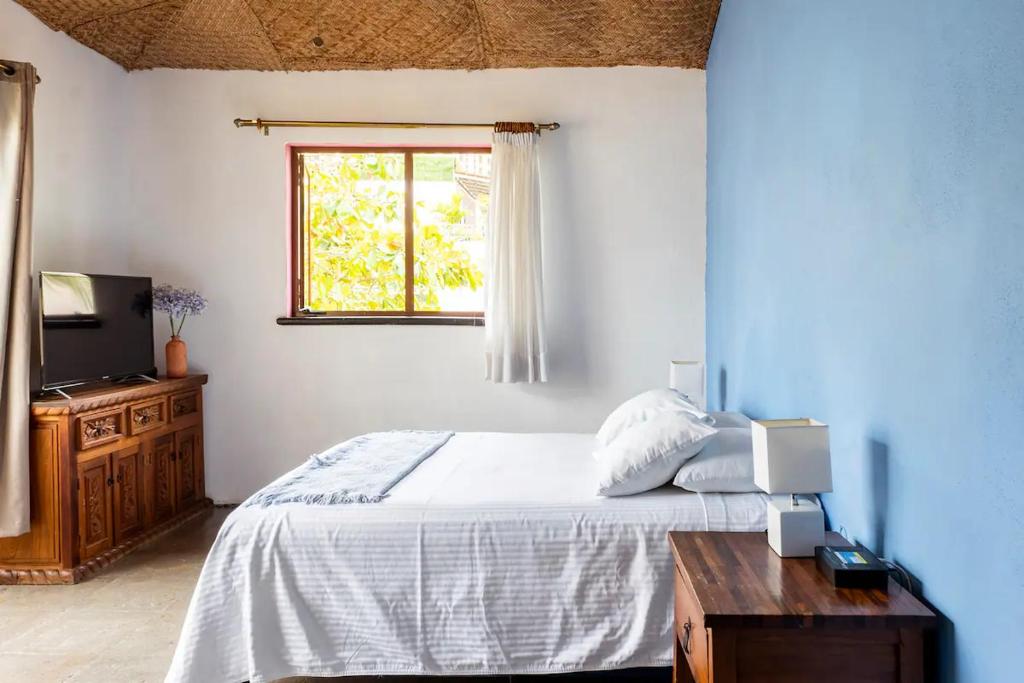 Postel nebo postele na pokoji v ubytování Casa La Columna