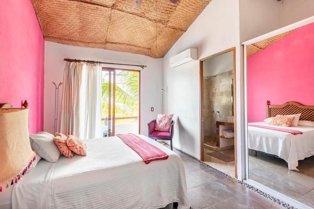 Postel nebo postele na pokoji v ubytování Casa La Columna