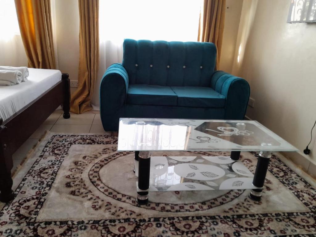 Postel nebo postele na pokoji v ubytování Galene Abode Studio Apartment, Nyali