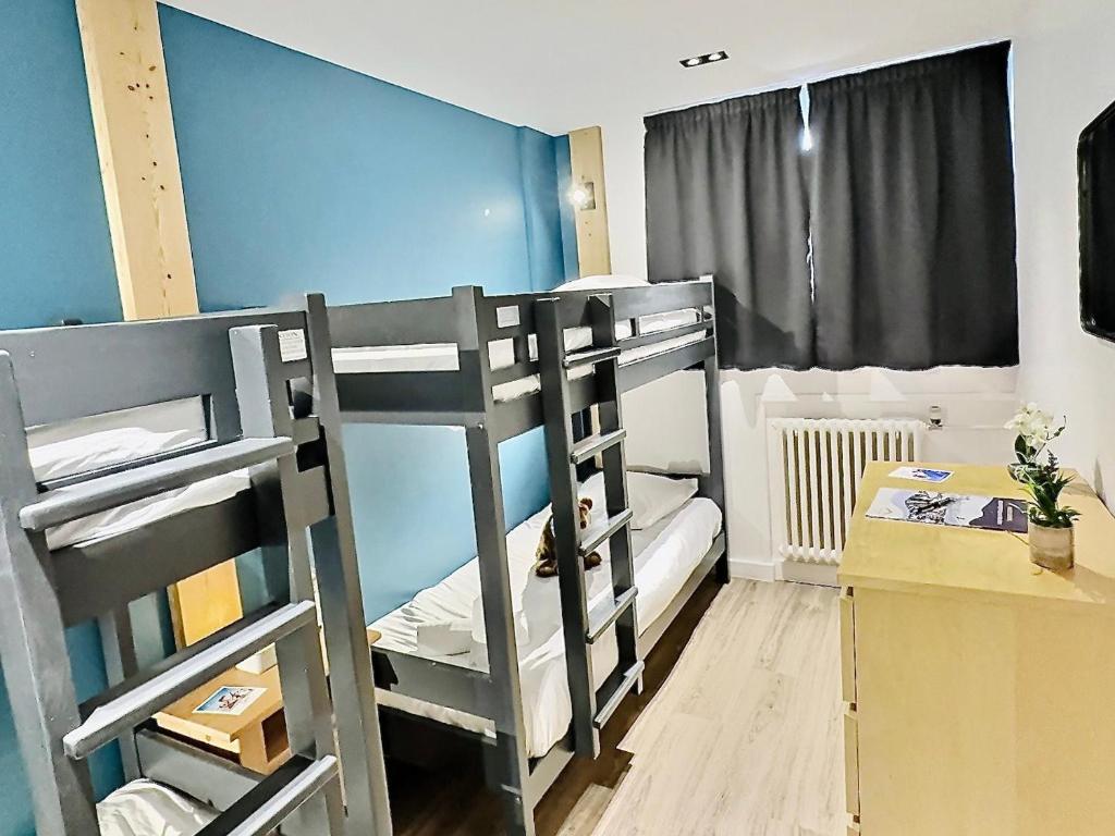 Posteľ alebo postele v izbe v ubytovaní Appartement 3 pièces pour 8 à Tignes, proche pistes, balcon, TV, lave-vaisselle, non-fumeur - FR-1-411-535