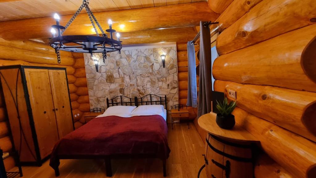 Postel nebo postele na pokoji v ubytování Penzion Srub Panorama