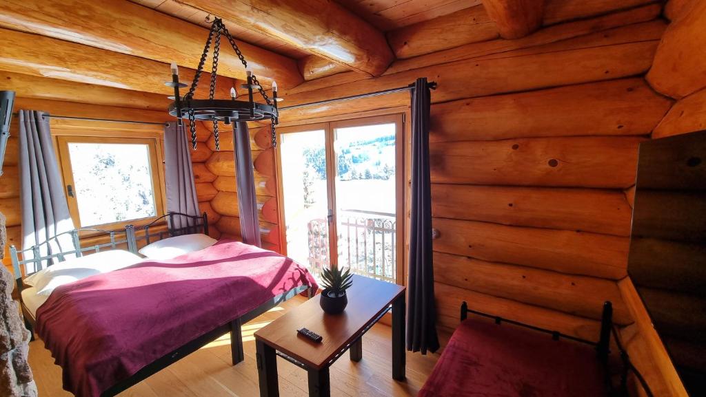 Postel nebo postele na pokoji v ubytování Penzion Srub Panorama