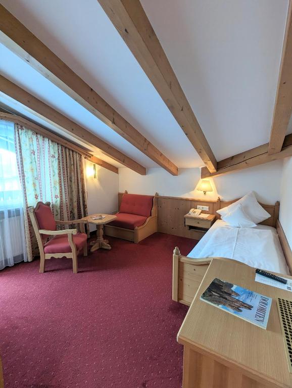 Letto o letti in una camera di Hotel Heinz
