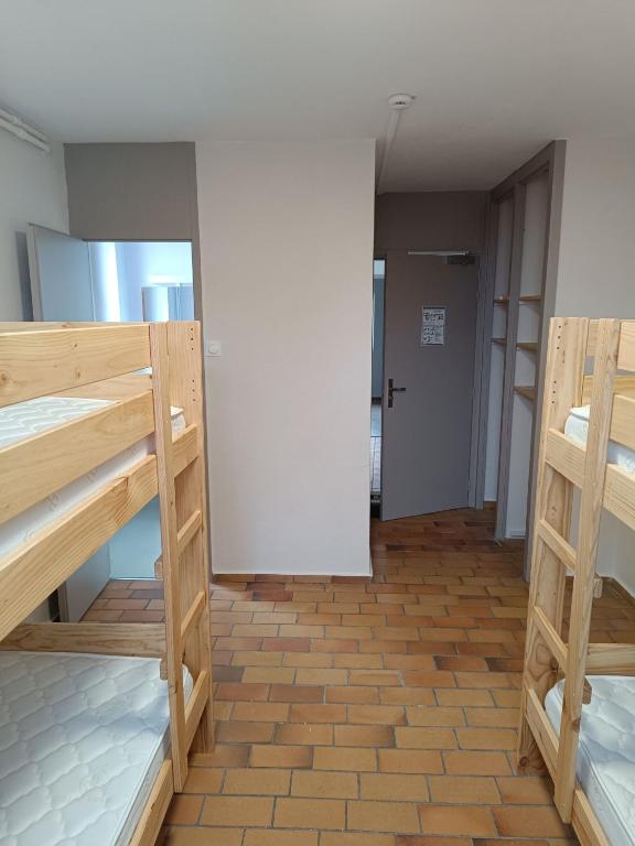 Postel nebo postele na pokoji v ubytování La Mansio de Bons