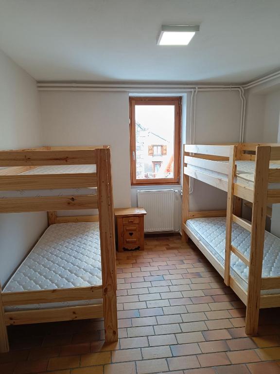 Postel nebo postele na pokoji v ubytování La Mansio de Bons