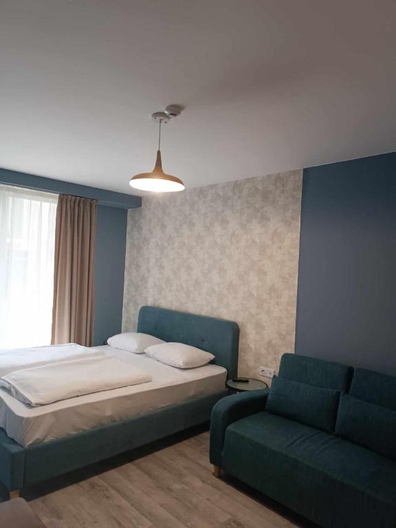 Postel nebo postele na pokoji v ubytování new Gudauri 214