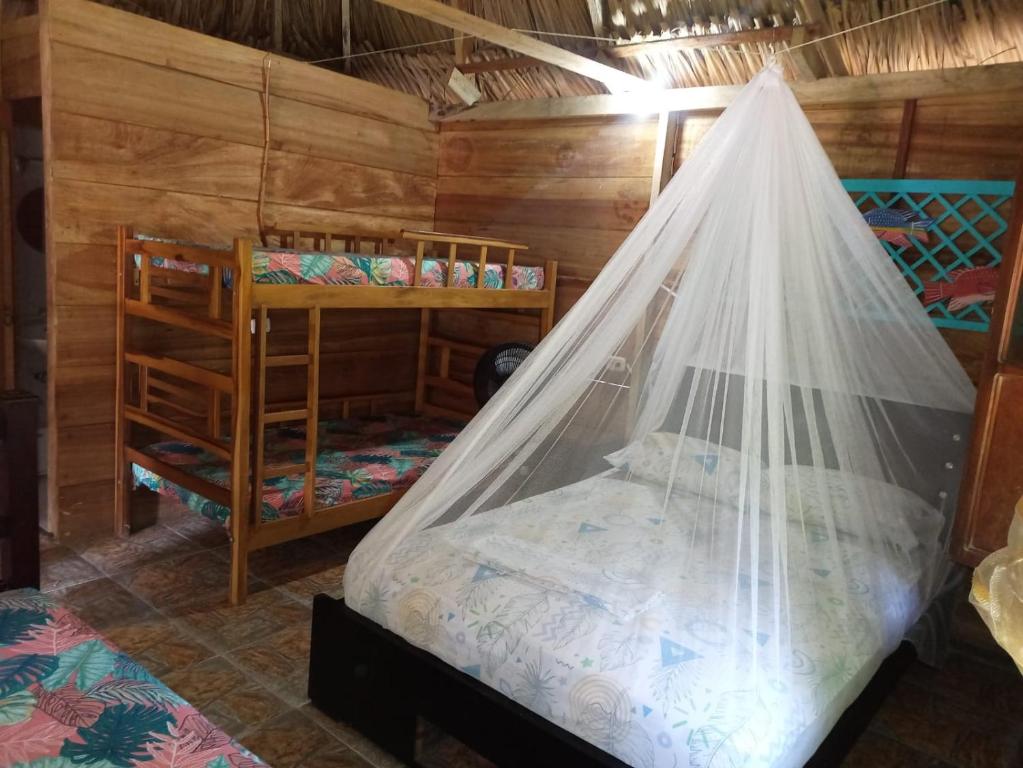 Letto o letti in una camera di ECOCABAÑAS DIOSA JAGUAR tayrona
