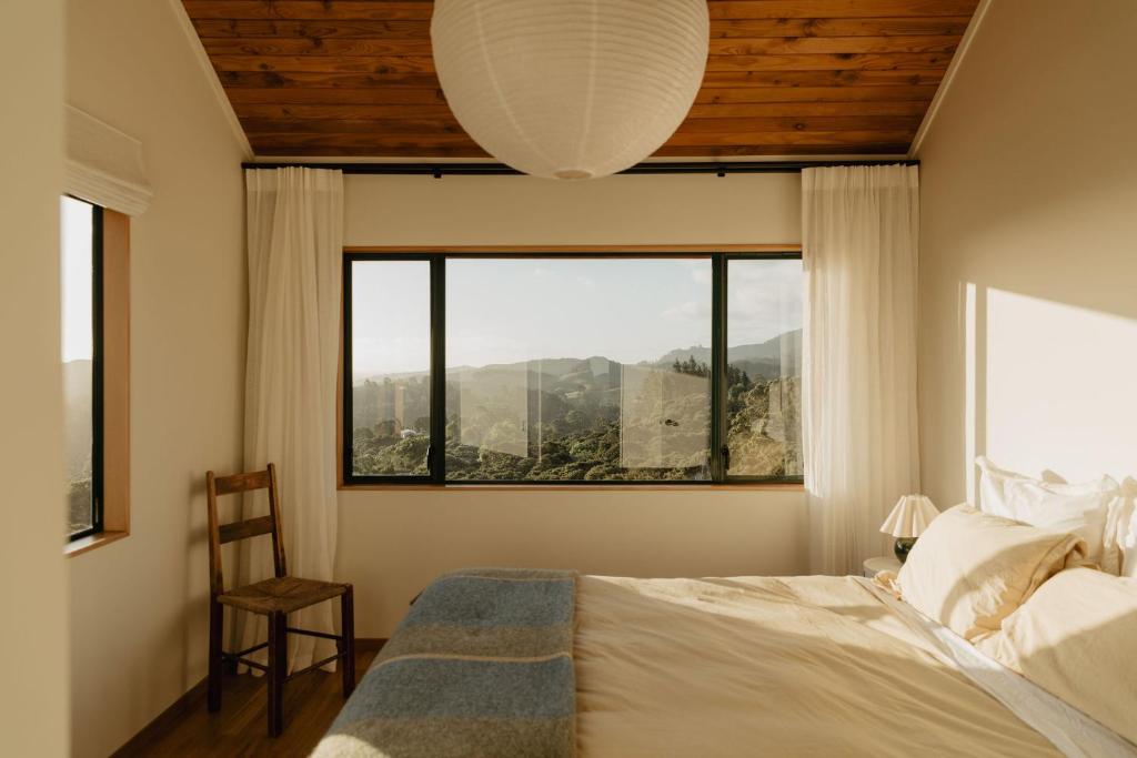 Postel nebo postele na pokoji v ubytování Buffalo Lodge