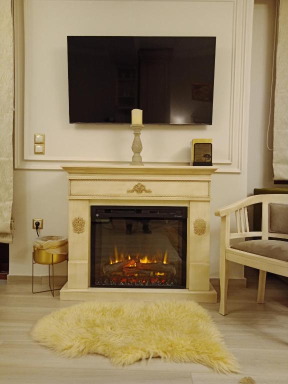 TV a/nebo společenská místnost v ubytování Vip Lepanto Castle Suites