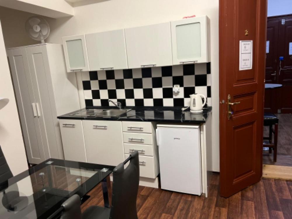 Kuchyň nebo kuchyňský kout v ubytování Apartment Moon