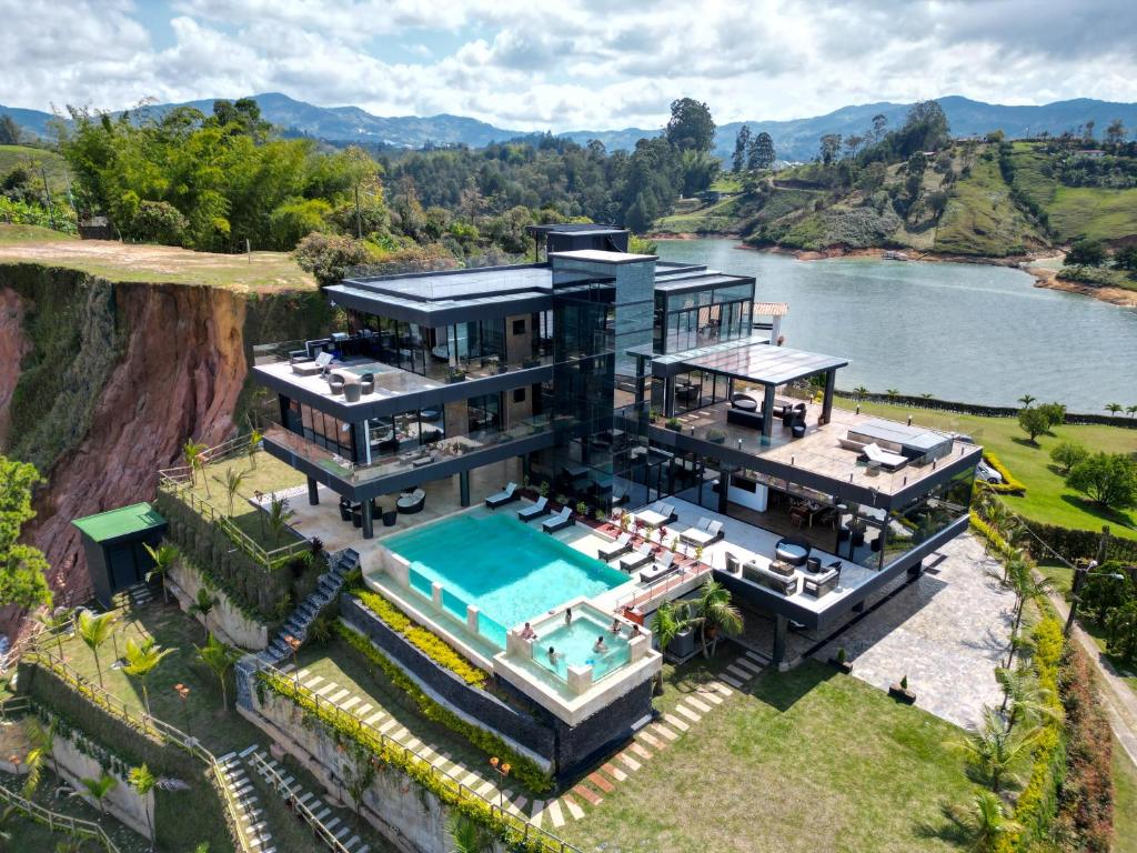 an aerial view of a house with a swimming pool at Vivanti Resort in Guatapé