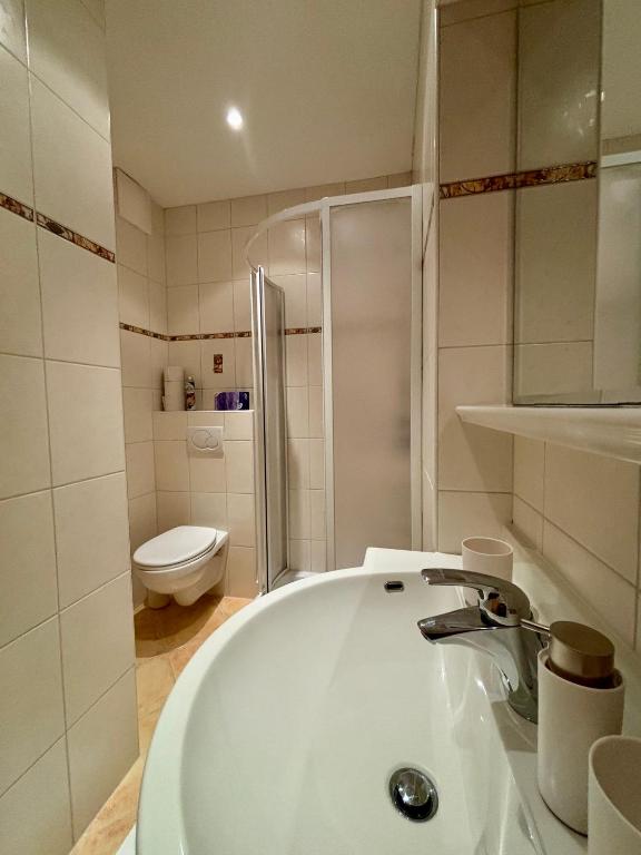 Koupelna v ubytování MB Apartment