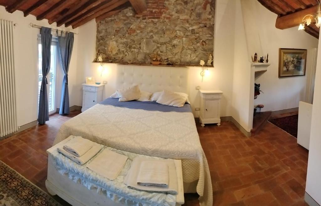 Posteľ alebo postele v izbe v ubytovaní B&B La Rosa Nel Verde