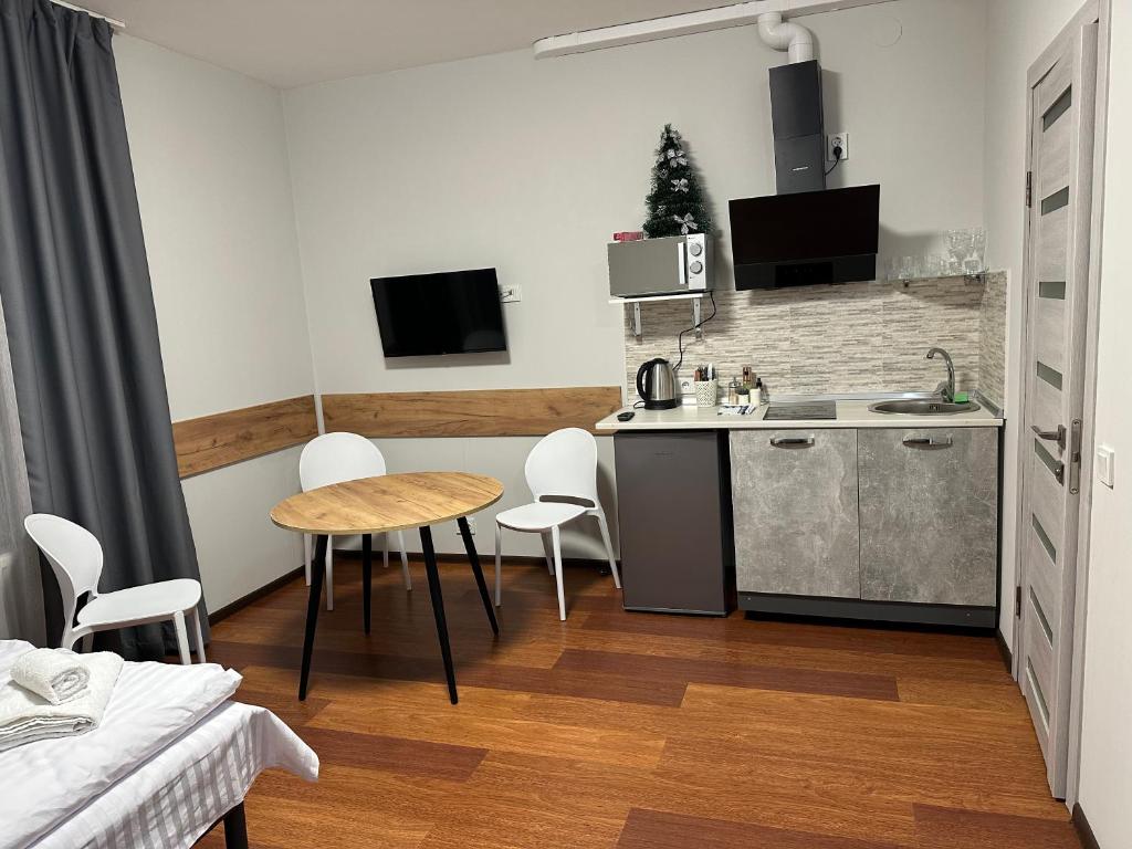 Kuchyň nebo kuchyňský kout v ubytování Modern Apartments Uzhgorod