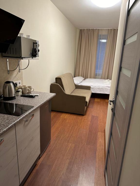 Postel nebo postele na pokoji v ubytování Modern Apartments Uzhgorod